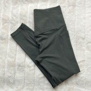 Athleta Olive Green Salutation Stash Pocket II 7/8 Tight Leggings